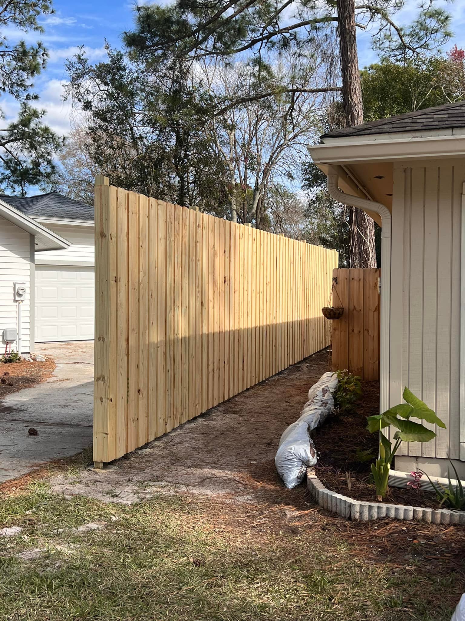 8 Foot fence installation completed.